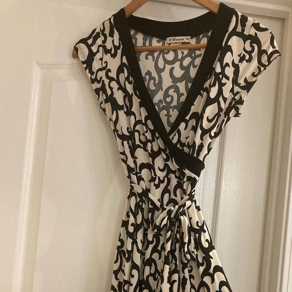 Black and beige faux Wrap Dress